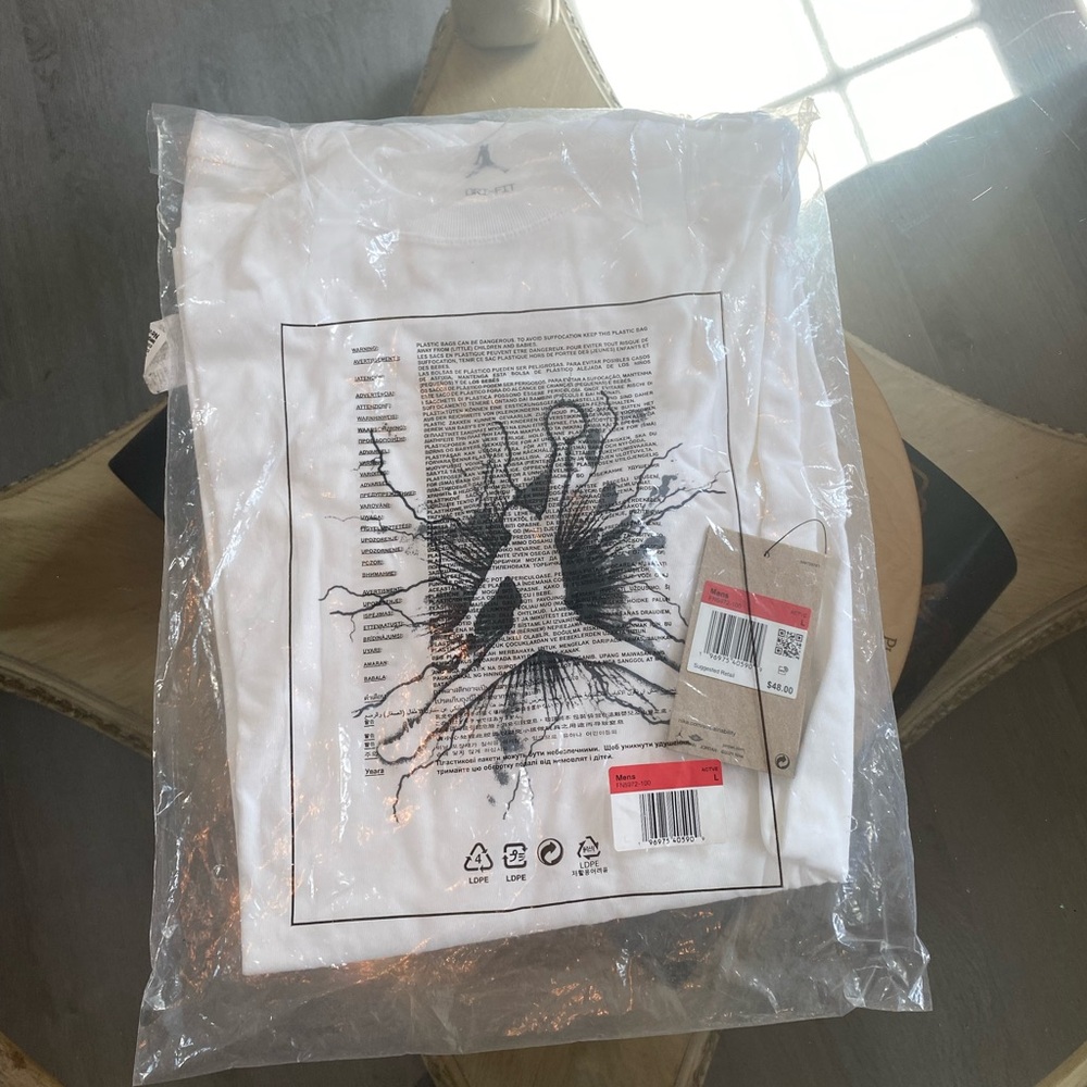 Jordan Nike White Dri-Fit Tshirt with Black Jumpman Graphic